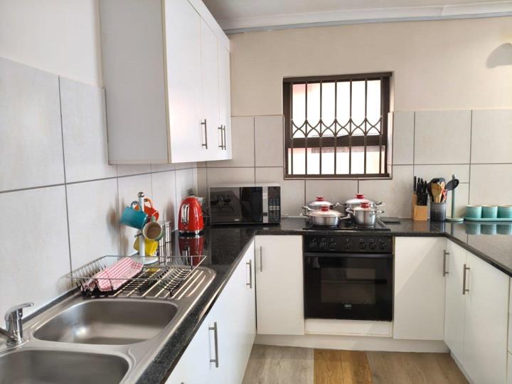 This modern, fully furnished 2-bedroom apartment is situated in a secure complex 2